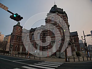 Red brick building classic old Bank of Iwate in Morioka city at sunrise.