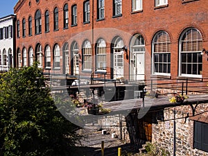 Red brick buildings with wooden bridges attached in Savannah, Gerorgia