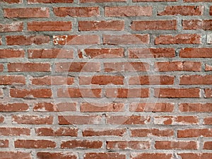 Red brick and cement wall