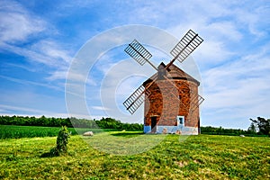 red brick historic wind mill