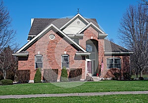 Red Brick House with Tall Entrance