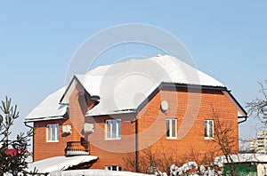 Red brick house in winter time