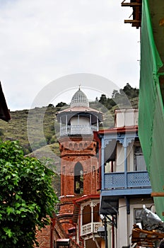 Red brick minaret of Jumah Islamic Central Muslim mosque Tbilisi Georgia photo