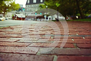 Red brick pavement in Boston, Massachusetts, USA. Selective focus