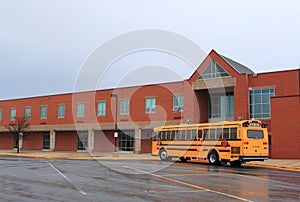 School Building with Bus photo