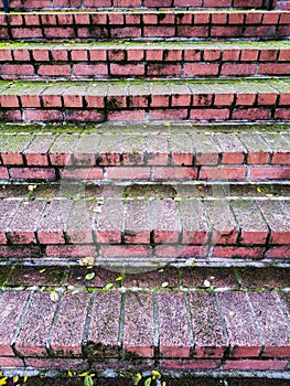 Red Brick Staircase with moss