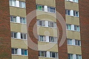 Old building windows downtown city vintage architecture red brick and stone apartments