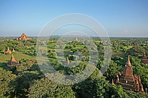 The red brick stupas and pagodas of the Bagan plains stretch out to the horizon