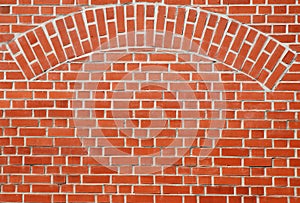 Red brick wall with arch