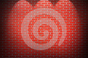 Red brick wall background with beams of light