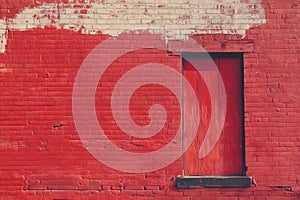 Red brick wall background and door.