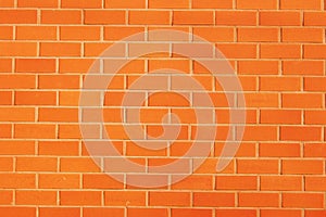 Red brick wall background - texture pattern for continuous replicate. Brick wall background for text and picture. Orange backgroun