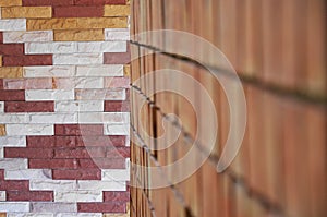 Red brick wall background texture weathered a corner for interior design