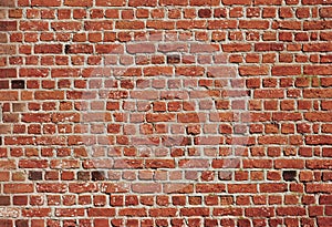 Red brick wall close-up