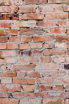 Red brick wall, close-up, brickwork background. Old building materials