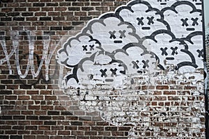 Red brick wall with dead clouds