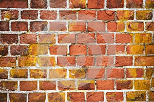 Red brick wall of old house, red brick texture, reliable brickwork masonry with bricklayer