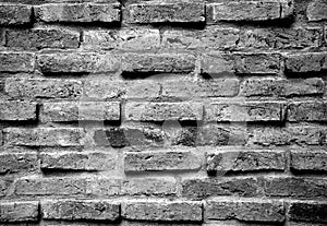 Red brick wall texture for background in black and white