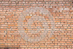 Red brick wall texture grunge background for interior and home design. Wide panoramic photo of the building with good detail. Abst