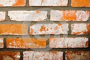 Red brick wall texture grunge background with vignetted corners