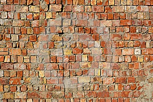 Red brick wall texture grunge background with vignetted corners, may use to interior design