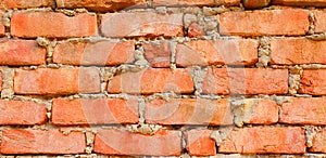 Red brick wall. Texture of old dark brown and red brick wall background