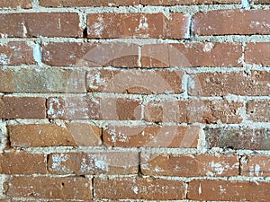 Red brick wall under renovation photo