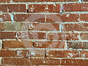 Red brick wall under renovation photo