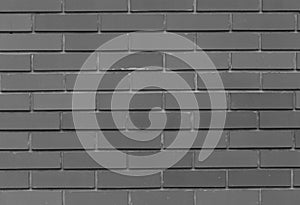 Old wall of red briks tiled background, regular block texture.