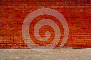 The red brick walls and cement floors.