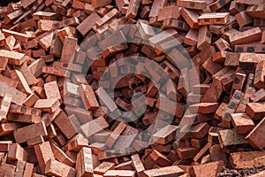 Red bricks stacked on construction sites