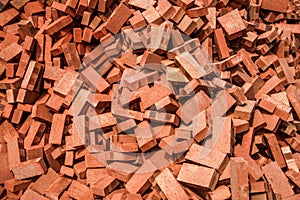 Red bricks stacked on construction sites