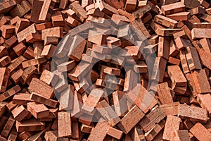 Red bricks stacked on construction sites