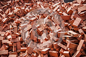 Red bricks stacked on construction sites