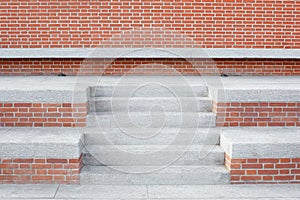 Red bricks wall with stone stairway and steps, nobody