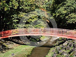 Red bridge across the Togawa river in Shimosuwa - Nagano prefecture, Japan