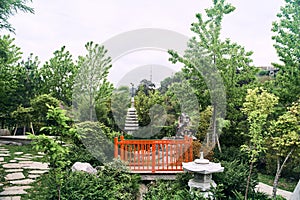 Red bridge in the Japanese park in the botanical garden in Tbilisi