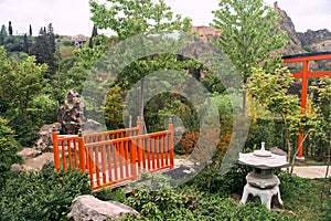 Red bridge in the Japanese park in the botanical garden in Tbilisi