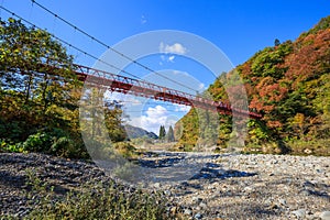 Red bridge, Kami No Iwahashi in Dakigaeri Valley - Senboku, Akita, Japan