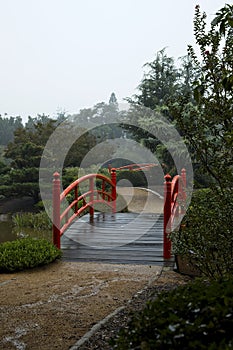 A red bridge leading to further bridges