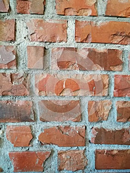 Red brown brick block wall background in restaurant