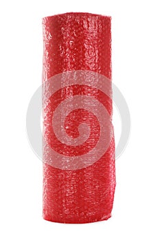 Red bubble wrap roll isolated on white