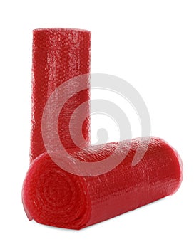 Red bubble wrap rolls isolated on white