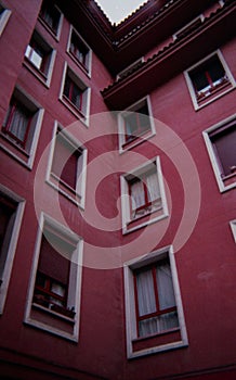 Red building with cloudless sky photo