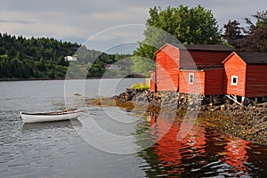 Red building and dinghy