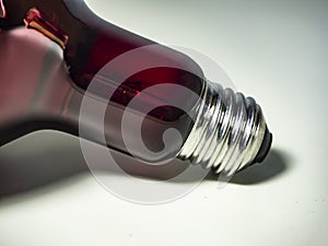 red bulb on a white background