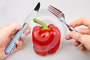 Red bulgarian pepper knife and fork