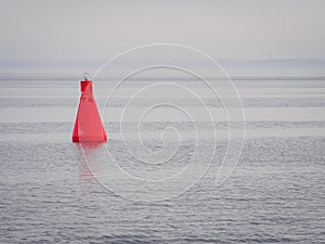 Red buoy as a navigation mark