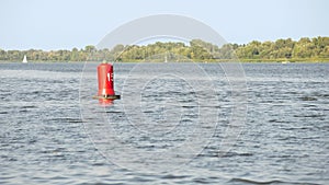 Red Buoy on the River
