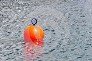 Red Buoy for safety swimming in water